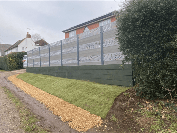 Low maintenance composite decorative fence panel, with painted fence posts